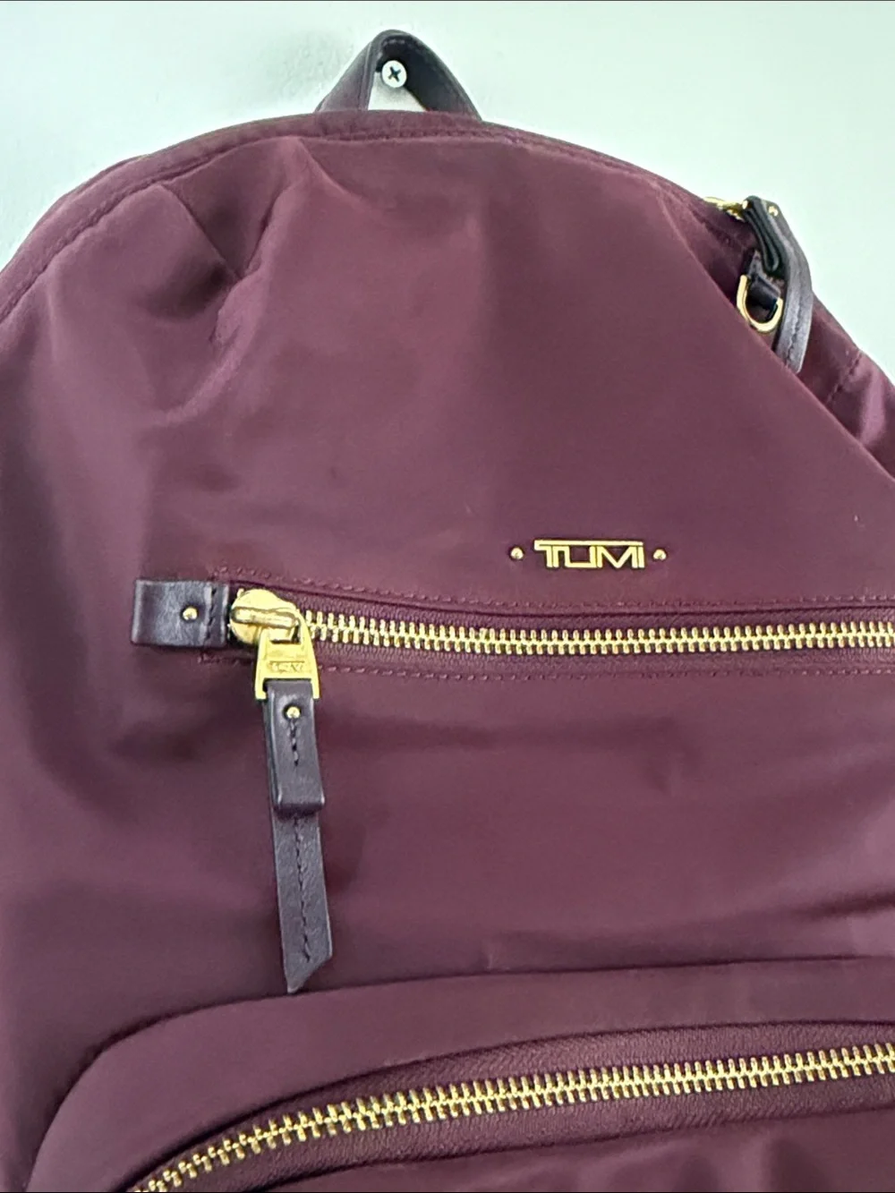 Tumi Men's Burgundy Nylon Backpack with Gold Hardware